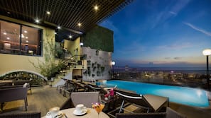 Outdoor pool, pool umbrellas, pool loungers