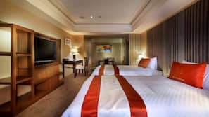 Premium bedding, down comforters, minibar, in-room safe