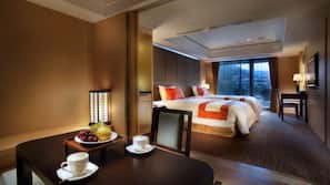 Premium bedding, down comforters, minibar, in-room safe