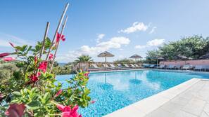 Outdoor pool, pool umbrellas, pool loungers