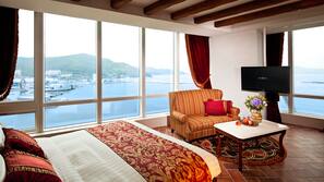 Premium bedding, down comforters, minibar, in-room safe