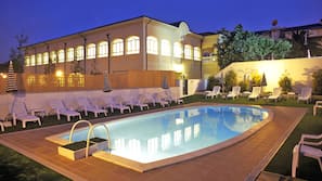Seasonal outdoor pool, pool umbrellas, pool loungers