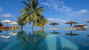 Outdoor pool, free pool cabanas, pool umbrellas