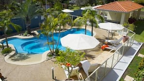 Outdoor pool, pool umbrellas, pool loungers