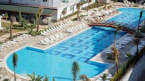 2 outdoor pools, pool umbrellas, pool loungers