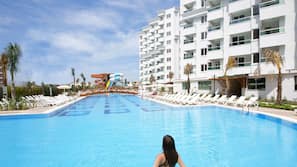 2 outdoor pools, pool umbrellas, pool loungers