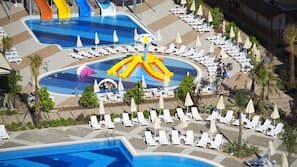2 outdoor pools, pool umbrellas, pool loungers