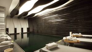 Indoor pool, open 9:00 AM to 10:00 PM, pool loungers