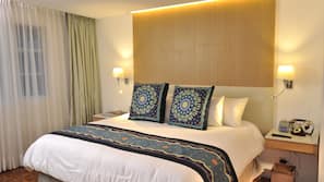 Ropa de cama de alta calidad y minibar con artículos gratuitos