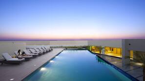 Outdoor pool, open 8:00 AM to 8:00 PM, pool umbrellas, sun loungers