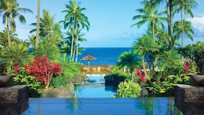 Outdoor pool, pool umbrellas, sun loungers