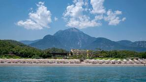 On the beach, beach cabanas, sun loungers, beach umbrellas
