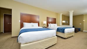Pillowtop beds, desk, blackout drapes, iron/ironing board