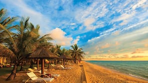 Private beach, sun loungers, beach umbrellas, beach bar