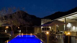 Outdoor pool, open 6:00 AM to 6:00 PM, pool umbrellas, pool loungers
