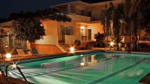 Outdoor pool, pool umbrellas, pool loungers