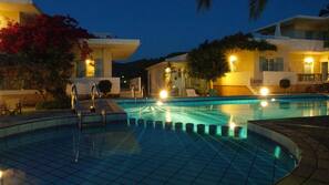 Outdoor pool, pool umbrellas, pool loungers