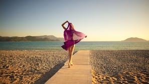 On the beach, sun-loungers, beach umbrellas, beach towels