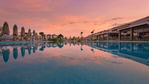Indoor pool, 2 outdoor pools, open open 24 hours a day, pool umbrellas
