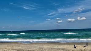 On the beach, sun-loungers, beach towels
