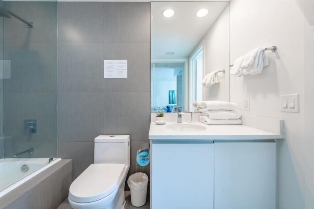 Beach Front Condo | Balcony with Partial Ocean Views | Beach Access+Chairs