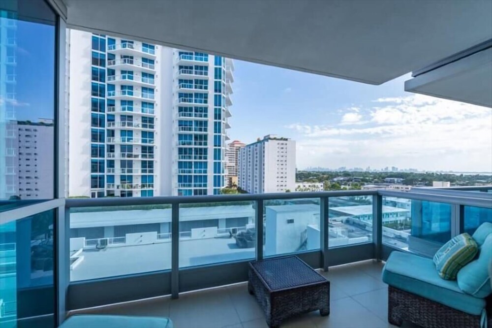 Beach Front Condo | Balcony with Partial Ocean Views | Beach Access+Chairs
