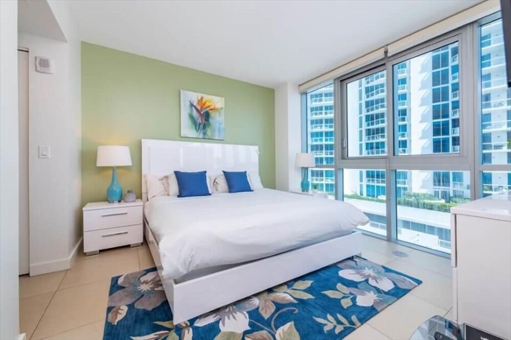 Beach Front Condo | Balcony with Partial Ocean Views | Beach Access+Chairs
