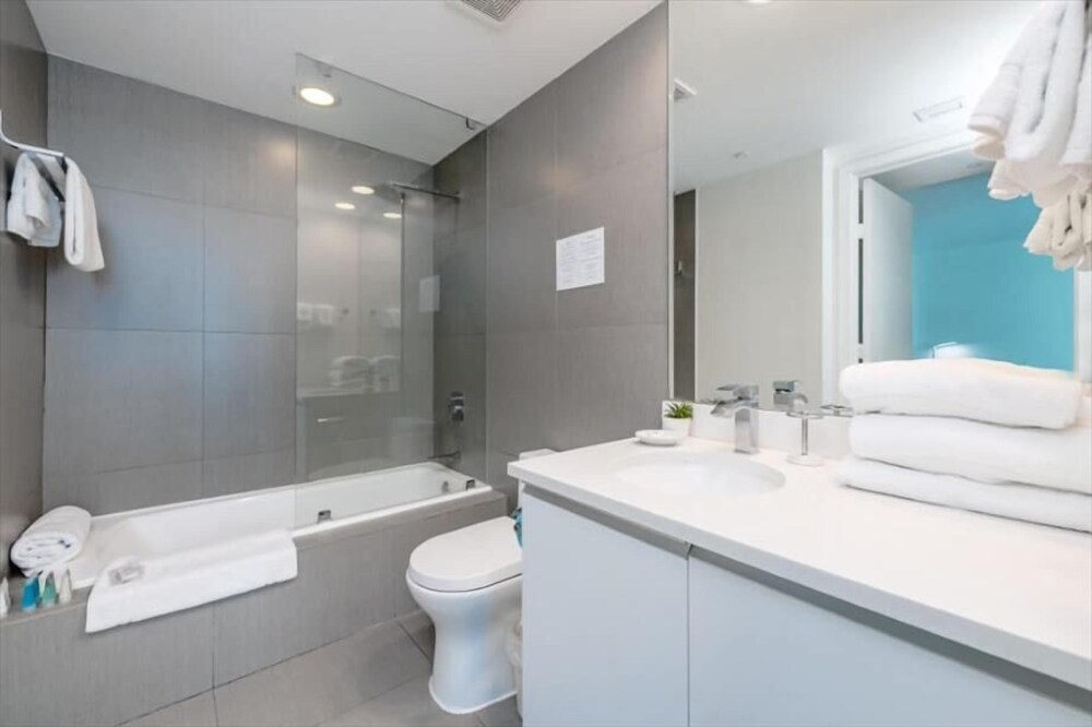 Beach Front Condo | Balcony with Partial Ocean Views | Beach Access+Chairs