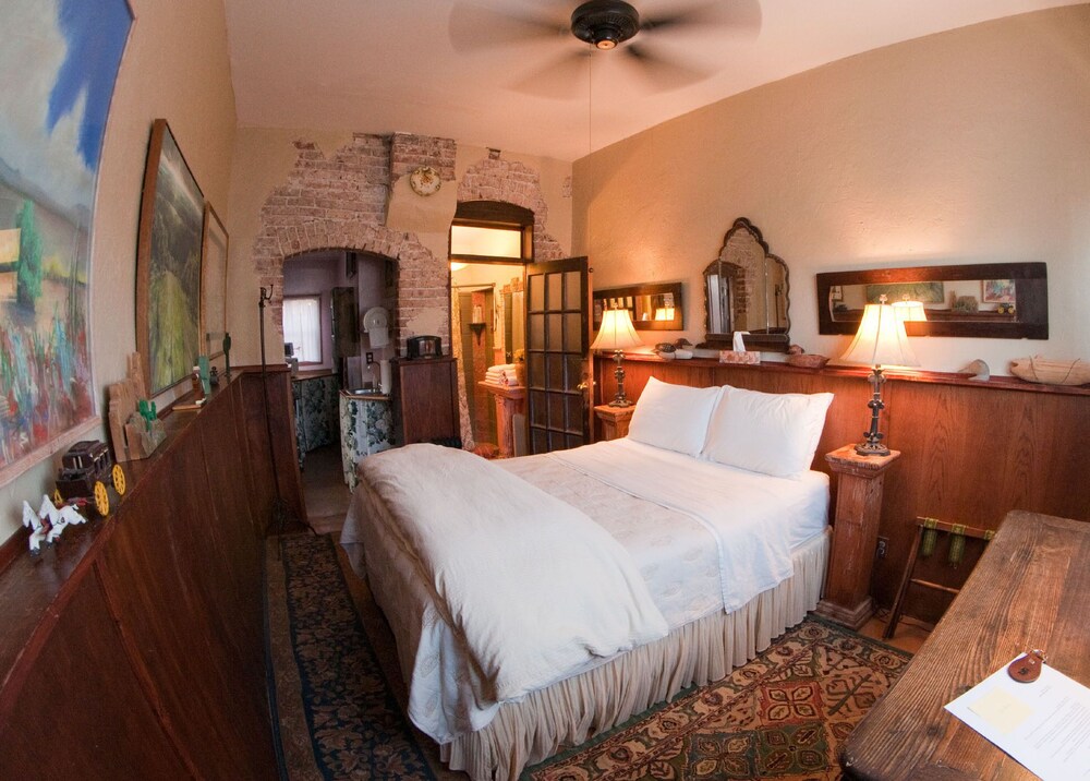 Quiet room in historic hotel, with queen bed, attached bath and kitchenette.