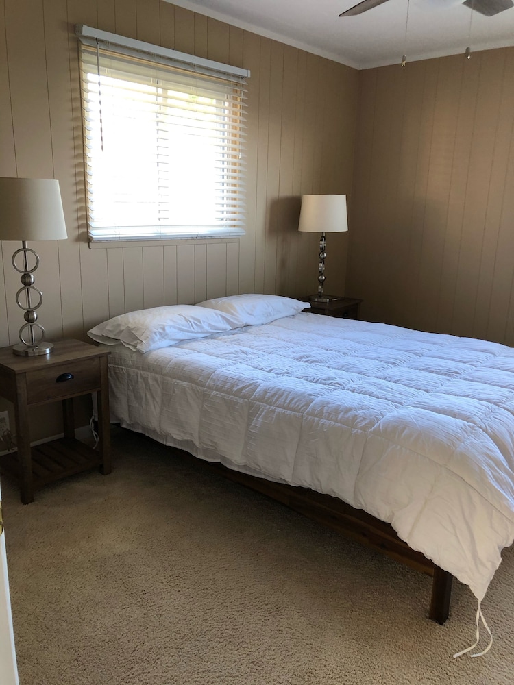 Adorable 4 bedroom lakefront home with dock on a quiet street