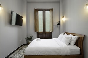 Signature Room | Individually decorated, individually furnished, desk, laptop workspace