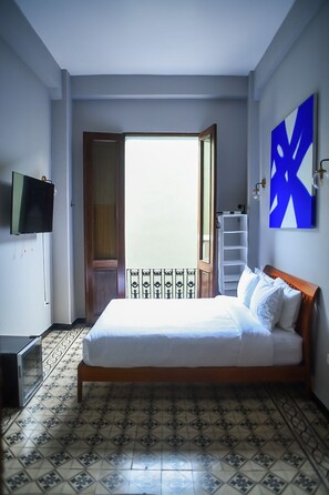 Signature Room | Individually decorated, individually furnished, desk, laptop workspace