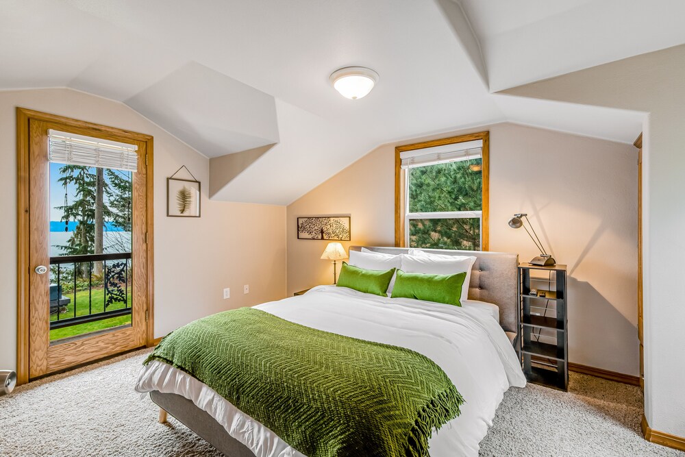 Stunning waterfront getaway with firepit, woodstove, & scenic deck