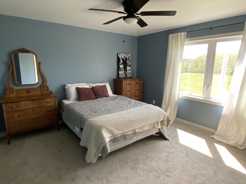 BEAUTIFUL NEW CUSTOM HOME ON PRIVATE 12 ACRES OF WOODS & MEADOWS