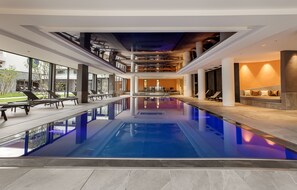 Indoor pool, pool umbrellas, sun loungers