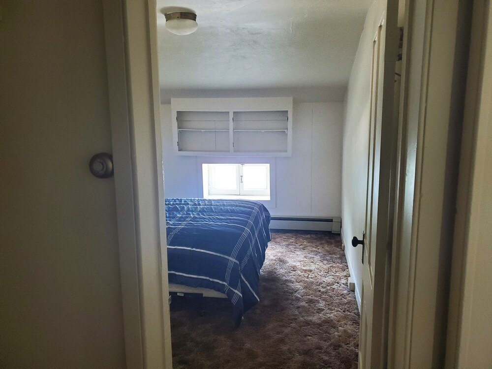 Downtown location w/ parking. Transit stop across the street. Unit 4 of