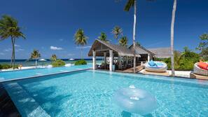 Outdoor pool, open 7:00 AM to 11:30 PM, pool umbrellas, pool loungers