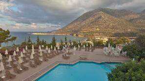 2 outdoor pools, pool umbrellas, pool loungers