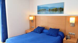 Ropa de cama de alta calidad, minibar, caja fuerte