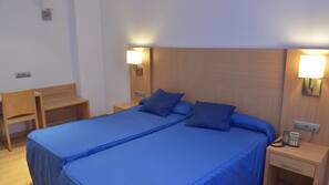 Ropa de cama de alta calidad, minibar, caja fuerte
