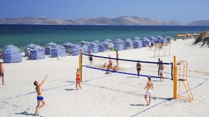 On the beach, sun loungers, beach umbrellas, beach towels