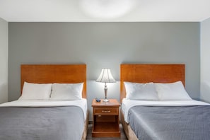 Standard Room, 2 Queen Beds, Non Smoking | Pillowtop beds, desk, laptop workspace, blackout drapes