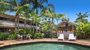 Outdoor pool, pool umbrellas, pool loungers