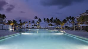 Outdoor pool, pool umbrellas, sun loungers