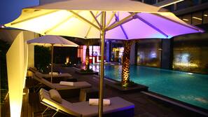 Outdoor pool, pool umbrellas, sun loungers