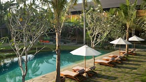 2 outdoor pools, pool umbrellas, pool loungers