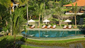 2 outdoor pools, pool umbrellas, pool loungers