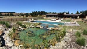 Seasonal outdoor pool, pool umbrellas, pool loungers