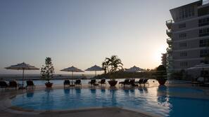 Outdoor pool, pool umbrellas, pool loungers