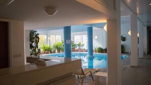 Indoor pool, seasonal outdoor pool, pool umbrellas, sun loungers